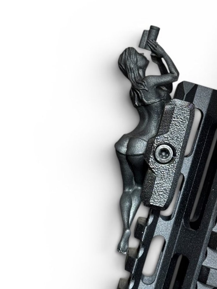 Spotter G — LH, the left-handed rail charm figure